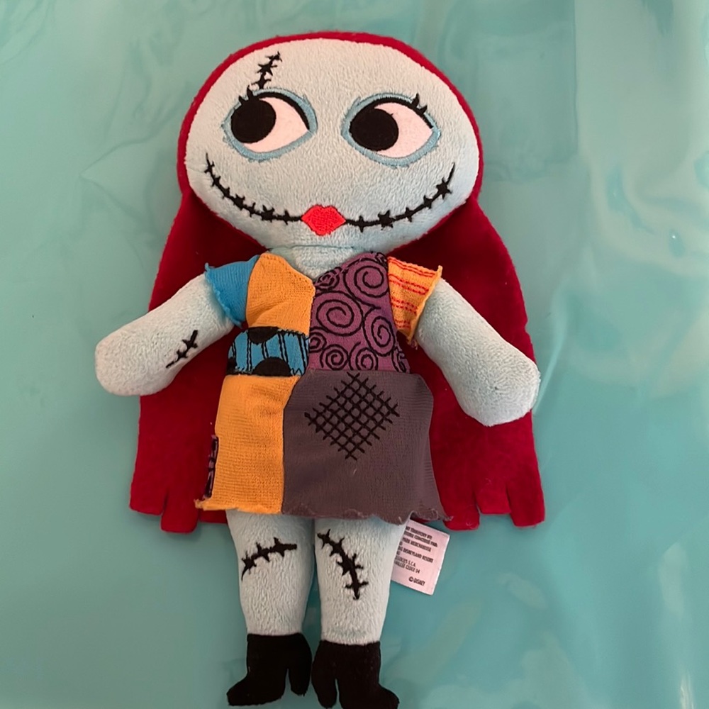 EXCLUSIVE DISNEY PARK ‘NIGHTMARE BEFORE CHRISTMAS’ SALLY PLUSH (9”)